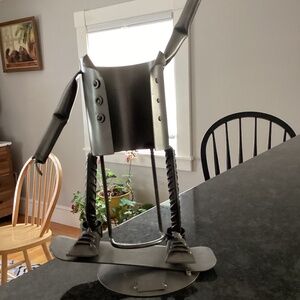 Wine bottle holder H & K steel on person on Skateboard?